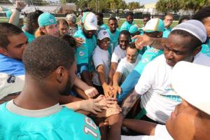 Miami Dolphins rookie class interacting with Special Olympics athletes