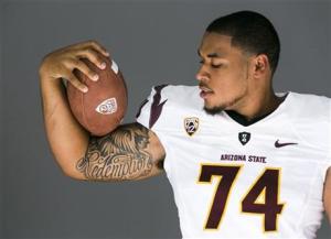 Arizona State offensive lineman Jamil Douglas poses for a photo at the 2014 Pac-12 NCAA college football media days at Paramount Studios in Los Angeles Thursday, July 24, 2014. (AP Photo)