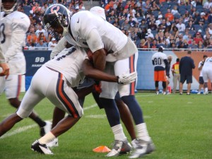 Tackling drills by the defensive backs. Photo: Omar Urena (Grafico Sports)